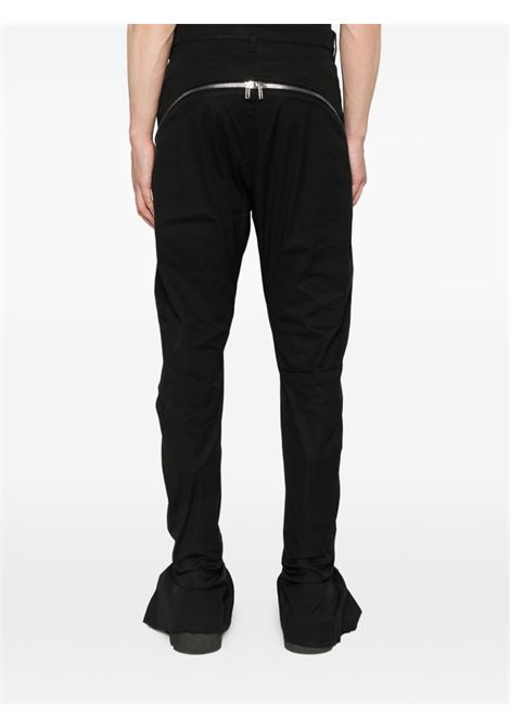 Pantaloni svasati con zip in nero Rick owens - uomo RICK OWENS | RU02E1343TE09